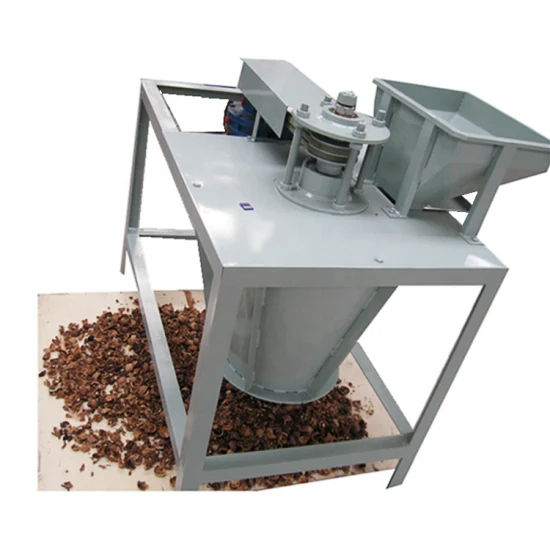 Автоматическая машина для раскалывания и очистки орехов макадамии и отделения ядер миндальной скорлупы.